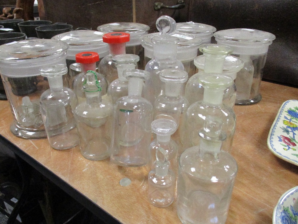 A selection of vintage glass storage jars and scientific/pharmacy bottles. - Image 2 of 2