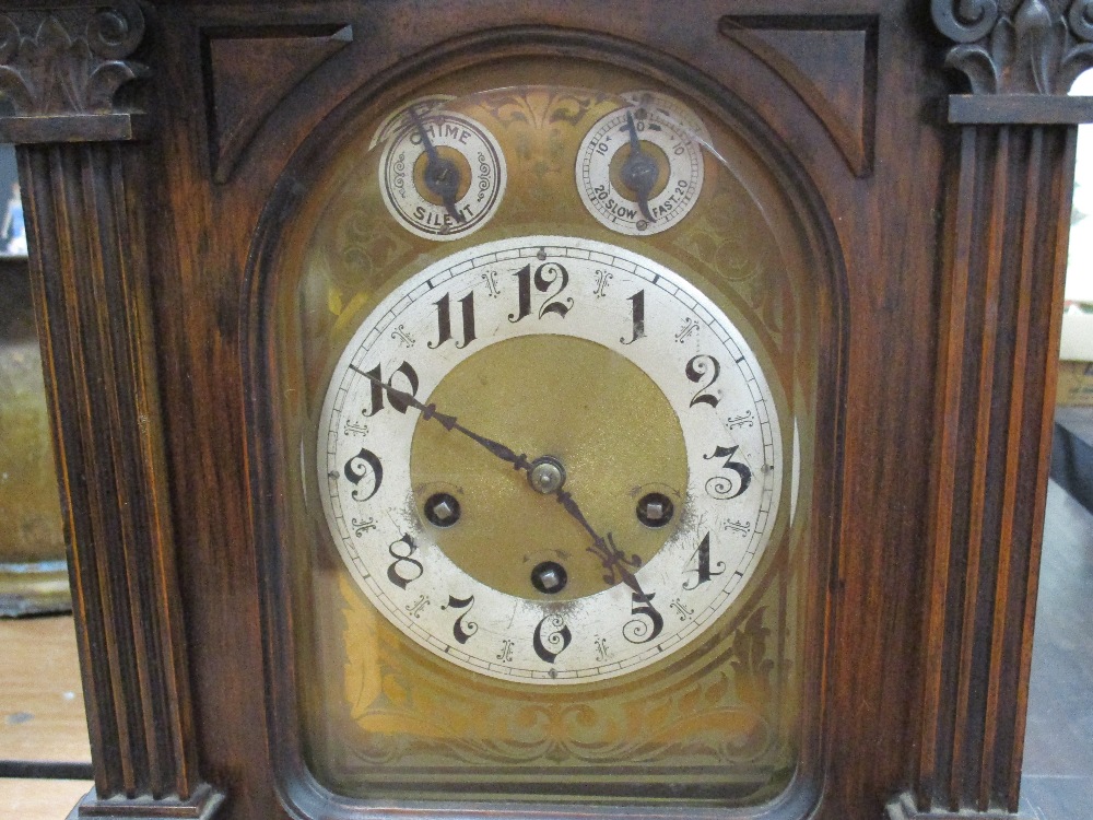 An early 20th century mahogany bracket clock, having beaded and carved detailing. - Image 2 of 2