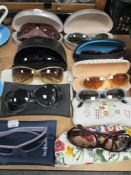 A selection of branded ladies sunglasses, including Ralph Lauren, Ferre, Lulu Guiness and more.