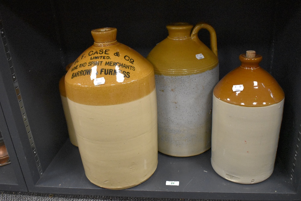 A Victorian R.F. Case & Co of Barrow in Furness flagon, another large stoneware flagon, and two