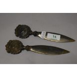 Two Victorian bronze handled Leopard Shirtings letter openers, both 16cm long