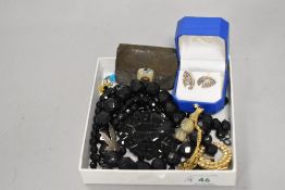 A small selection of costume jewellery including Mourning jewellery silver maple leaf brooch,