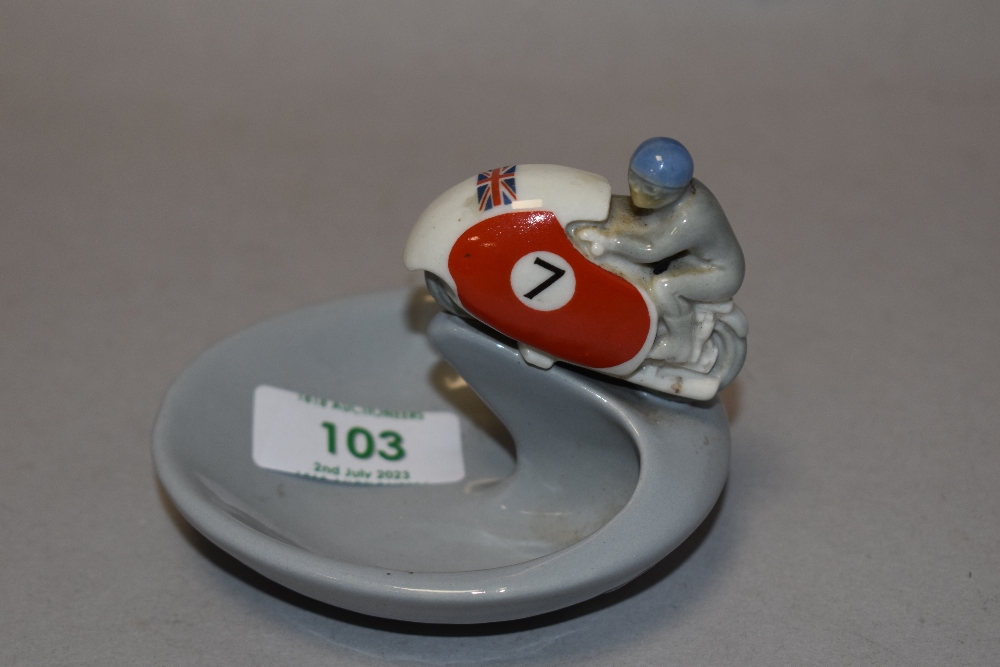 A mid century Wade ashtray in the form of an Isle of Man TT motorcycle.