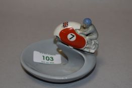 A mid century Wade ashtray in the form of an Isle of Man TT motorcycle.