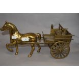 A cast brass horse and cart ornament, 40cm long