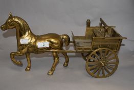 A cast brass horse and cart ornament, 40cm long