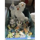 A pair of Staffordshire pottery dogs, assorted Lladro style Spanish studies and figurines and bird