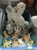 A pair of Staffordshire pottery dogs, assorted Lladro style Spanish studies and figurines and bird
