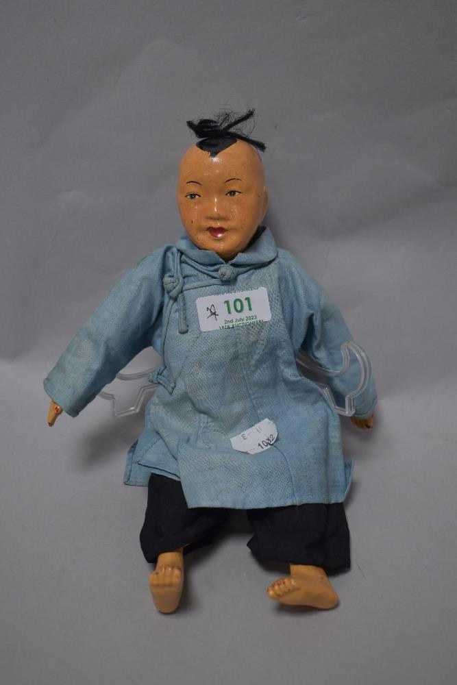 An early 20th century Door of Hope Mission doll, Chinese circa 1920, the finely carved wooden head