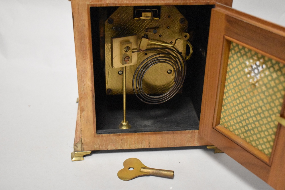 An early 20th Century bracket clock, having a two train movement, and housed within a walnut case - Image 2 of 2