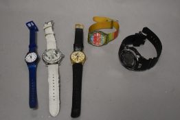 A selection of watches, including Mickey Mouse, Swatch and Casio G shock.