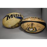 Two vintage rugby balls, one illustrated with the Newcastle Rugby Club crest, both with signatures
