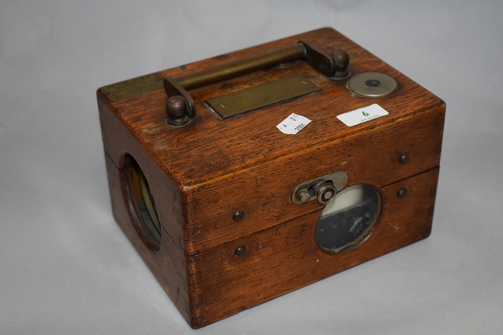 An early 20th Century oak cased pigeon clock, Constateur Imprimeur, by Gaston Simon, No. 23 707,