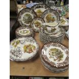 A collection of Palissy ware,' Game series' including plates, tureens and gravy boat.