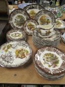 A collection of Palissy ware,' Game series' including plates, tureens and gravy boat.