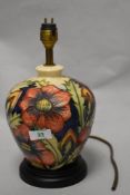 A William Moorcroft 'Pheasant's Eye' table lamp, of baluster form, measuring 29cm tall