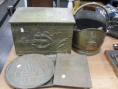 A varied lot of brass wares, including 1930s slipper box, coal helmet, wall plaques and tray.