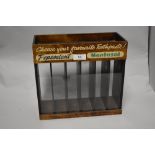 A vintage Pepsodent Mentasol six division advertising case with glass front, measuring 24cm x 26cm x