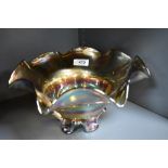 An Iridescent carnival glass bowl.