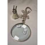 An English pewter cup, having hare head with antlers, sold with a magnifying glass with alligator