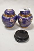 Two modern miniature cloisonné enamel ginger jars, of traditional design one retaining wooden stand