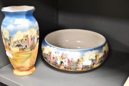 A 1930s fruit bowl and a vase, both depicting beefeaters and castle scene, marked NHP to underside.
