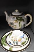 A Japanese HSC Fuji China teapot and trio, having lithophane to cup and traditional lake scene