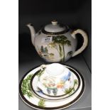 A Japanese HSC Fuji China teapot and trio, having lithophane to cup and traditional lake scene