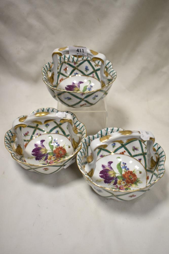 A group of three 'Royal Europe' ceramic baskets, decorated in the 19th century manner with foliate