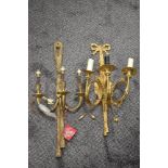 Two modern three branch heavy cast brass wall light fixtures.