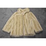 A ladies vintage Tissavel of France faux fur coat