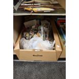 A carton of assorted stamps and stamp albums.