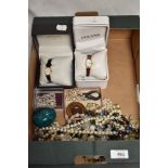 A box of costume jewellery, to include synthetic pearl and other decorative necklaces and two ladies