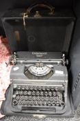 A vintage Underwood Universal typewriter in case.