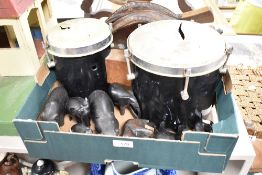 A set of bongo drums in need of new skins and eight African hard wood animals.