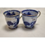Two 19th century blue and white transfer pattern tea cups, having gilt heightening, AF.