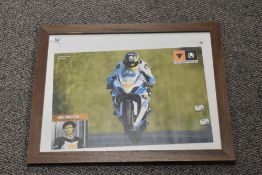 A framed print of Guy MArtin.