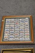 A framed collection of cigarette cards of automobilia interest