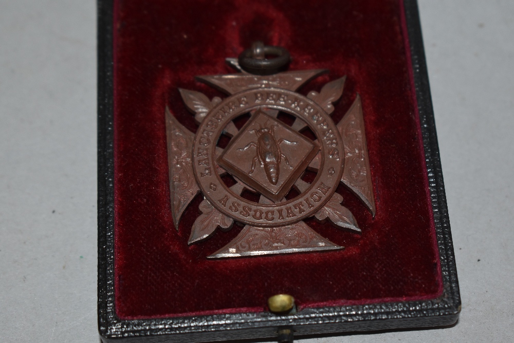 A Lancaster Beekeepers Association medal in presentation box, awarded to Issac Willan, 17th