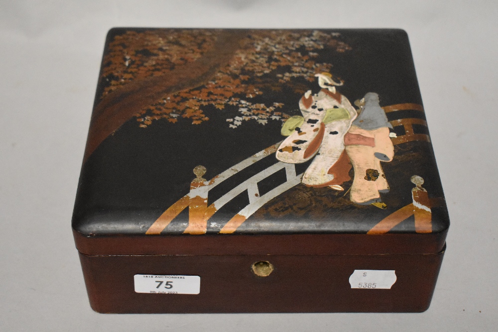 A vintage lacquered box, having bridge and tree scene, minus escutcheon, also included are a few
