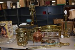 A quantity of brass and copperware, to include a four piece companion set, a brass embossed two