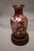 A Modern Chinese cloisonné enamel on copper vase, of baluster form and decorated with butterflies