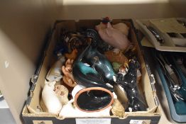 A box of assorted ceramic and porcelain ornaments, to include a Blue Mountain Collection duck, a