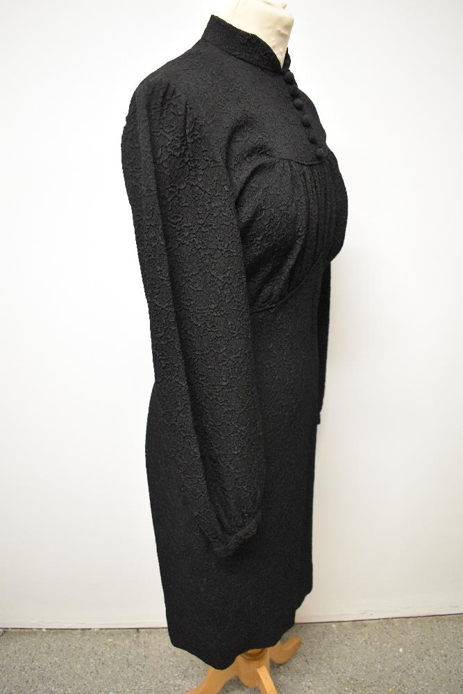 A 1930s/ 1940s textured day dress in black, having wide sleeves gathering into a fitted cuff, - Image 5 of 8