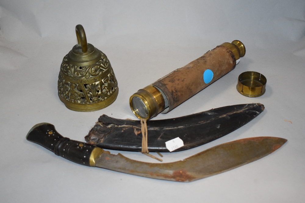 A 1940s knife, incised to back with Raipur, Pradesh 1942, with leather scabbard, a brass