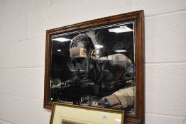 A framed mirror, of Humphrey Bogart interest.