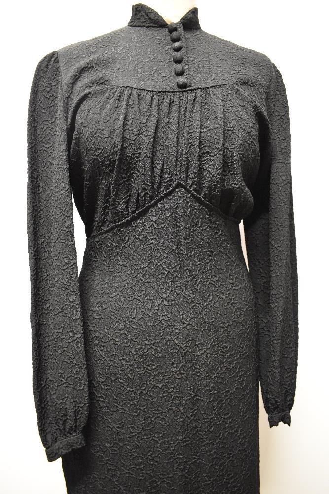 A 1930s/ 1940s textured day dress in black, having wide sleeves gathering into a fitted cuff, - Image 3 of 8
