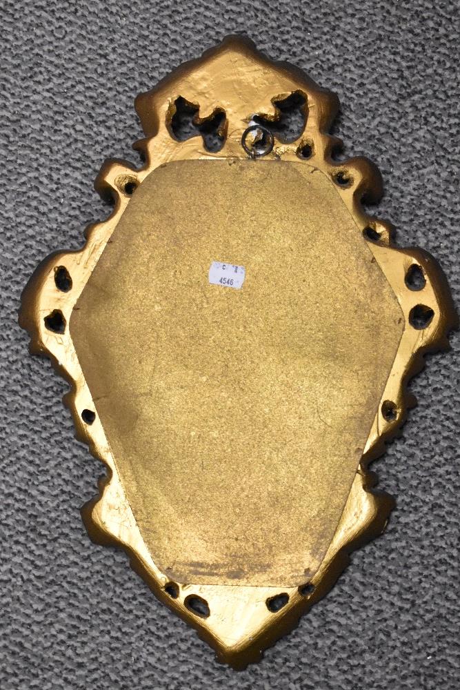 A reproduction Rococco style wall mirror with ornate gilt frame, measuring 50cm tall - Image 2 of 2
