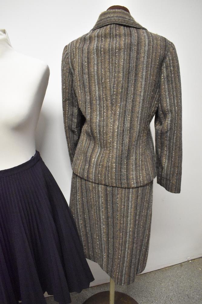 A vintage Windsmoor skirt suit and three skirts, including 1950s blue and grey herringbone and - Image 5 of 5