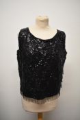 A 1960s black hand beaded wool evening top, Made in Hong Kong.